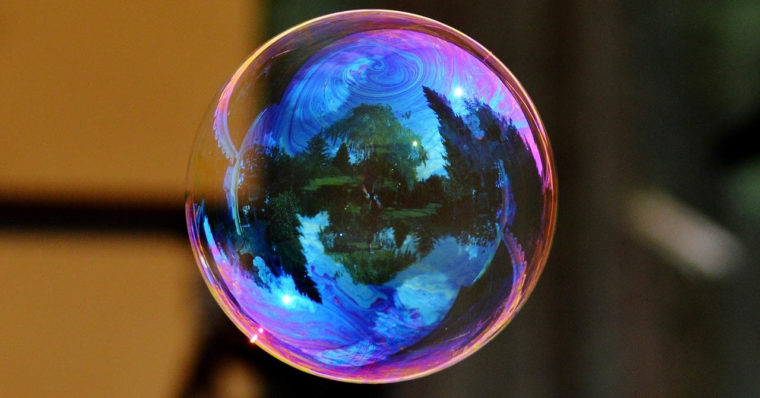 Photo of a large, colorful soap bubble. Creative Commons license, Pixbay.
