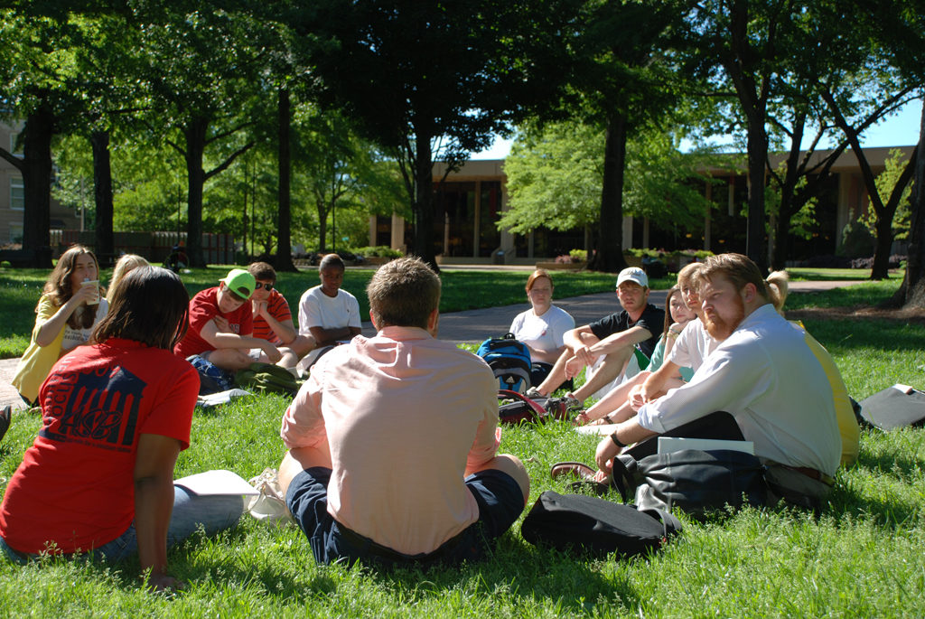 A class meeting outside.