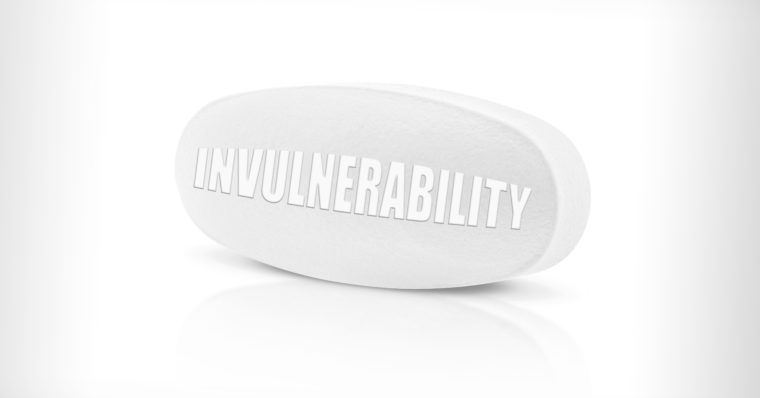 A pill inscribed with the word 'invulnerability.'