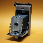 Photo of an old polaroid camera.